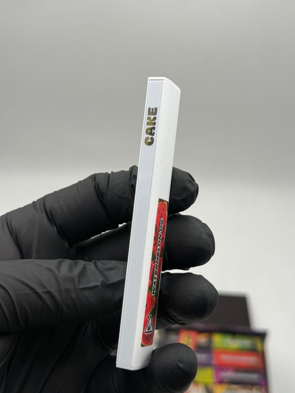 CAKE Black XXX Label 1.5g vape bar side view CAKE Black XXX Label 1.5g vape bar side view