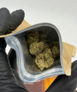 Holy Smokes 3.5g cannabis flower in an open resealable pouch